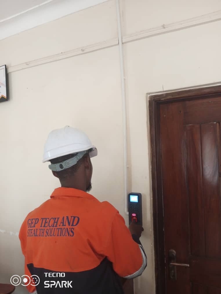 GEP TSS technician installing a biometric access reader