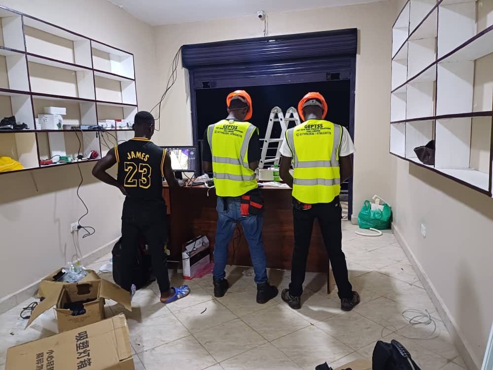 GEP TSS team setting up NVR and CCTV monitoring in a retail shop